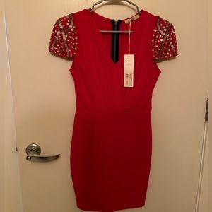 Italian style mini red dress with shoulder pads and detail